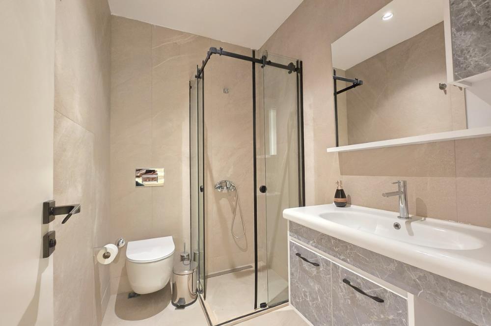 Denize yürüme mesafesinde Ormana cepheli 1.000m2 müstakil arsa içinde Deniz manzaralı 5+1 Villa