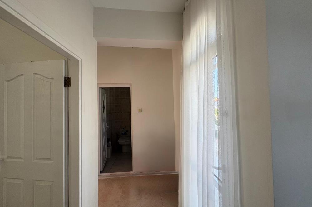 Çeşme Deniz Obası Sitesi'nde Satılık 2+1 Bahçeli Dubleks Villa