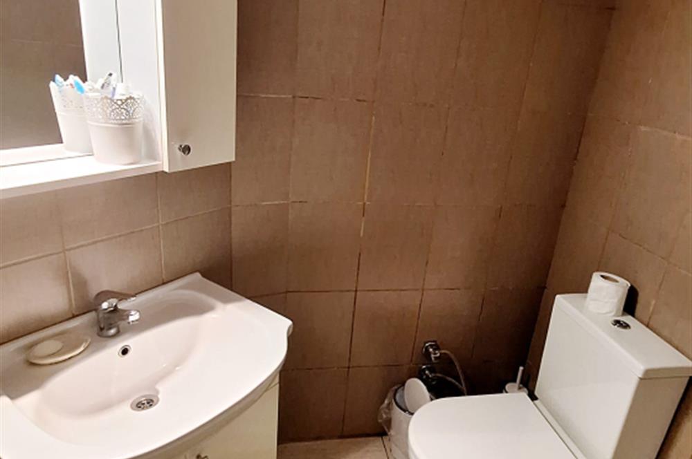 BODRUM GÜMÜŞLÜK GÜMSAN 1 SİTESİNDE YATIRIMLIK ÖZEL PLAJLI SU ARITMALI YAZLIK KIŞLIK  