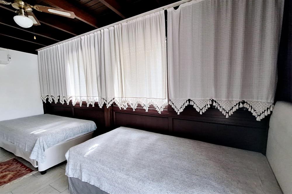 BODRUM GÜMÜŞLÜK GÜMSAN 1 SİTESİNDE YATIRIMLIK ÖZEL PLAJLI SU ARITMALI YAZLIK KIŞLIK  