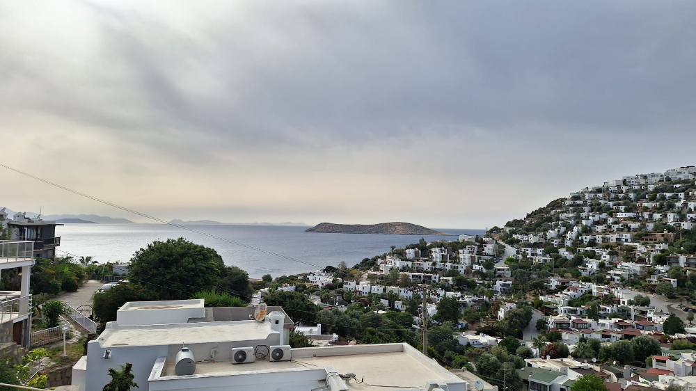 BODRUM GÜMÜŞLÜK GÜMSAN 1 SİTESİNDE YATIRIMLIK ÖZEL PLAJLI SU ARITMALI YAZLIK KIŞLIK  