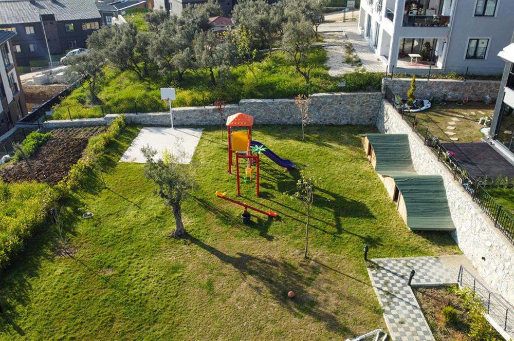 C21 Cius; Havuz ve Bahçeli Site İçerisinde Deniz Manzaralı Daire