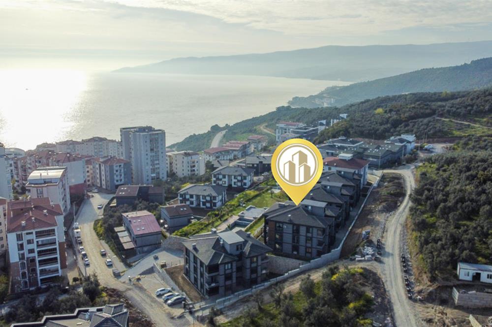 C21 Cius; Havuz ve Bahçeli Site İçerisinde Deniz Manzaralı Daire