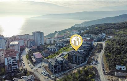 C21 Cius; Havuz ve Bahçeli Site İçerisinde Deniz Manzaralı Daire