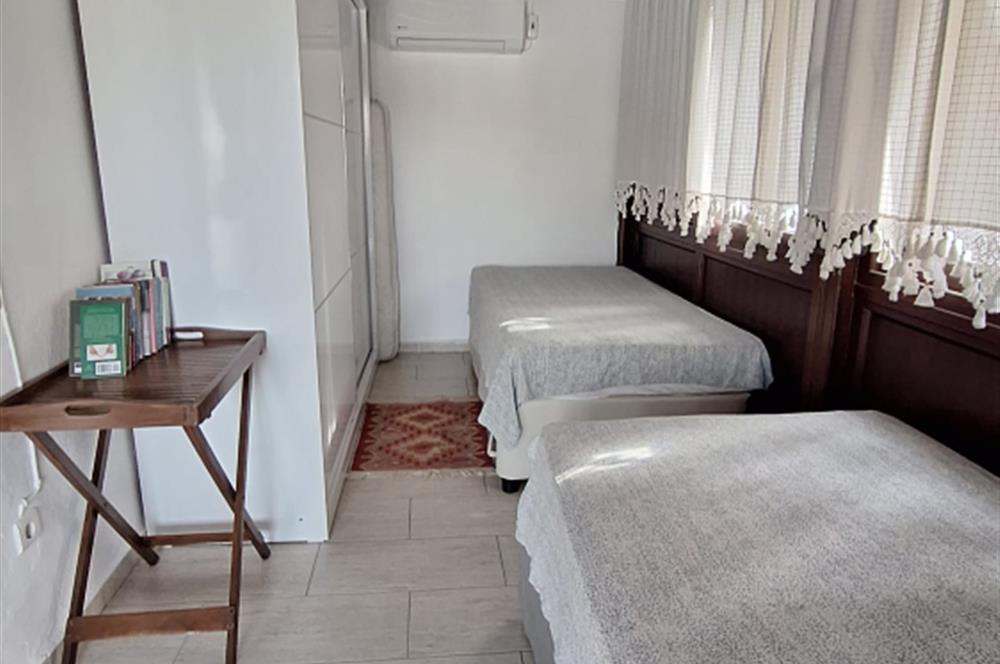 BODRUM GÜMÜŞLÜK GÜMSAN 1 SİTESİNDE YATIRIMLIK ÖZEL PLAJLI SU ARITMALI YAZLIK KIŞLIK  