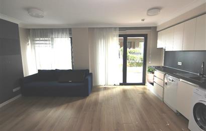 KOÇ BATI YURDUNA KOMŞU SATILIK 1+1 BAHÇELİ DAİRE