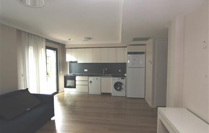 KOÇ BATI YURDUNA KOMŞU SATILIK 1+1 BAHÇELİ DAİRE