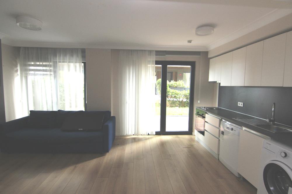 KOÇ BATI YURDUNA KOMŞU SATILIK 1+1 BAHÇELİ DAİRE