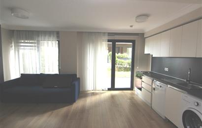 KOÇ BATI YURDUNA KOMŞU SATILIK 1+1 BAHÇELİ DAİRE