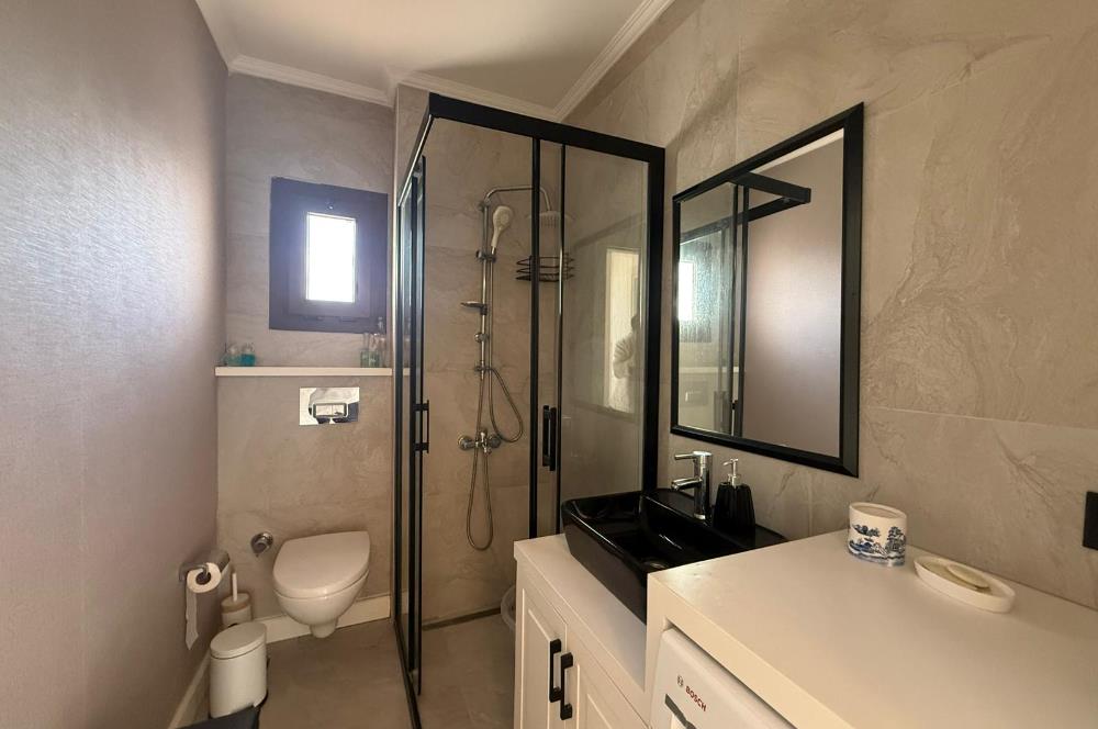 BODRUM GÜNDOĞAN'DA HAVUZLU PLAJLI KİRALIK VİLLA