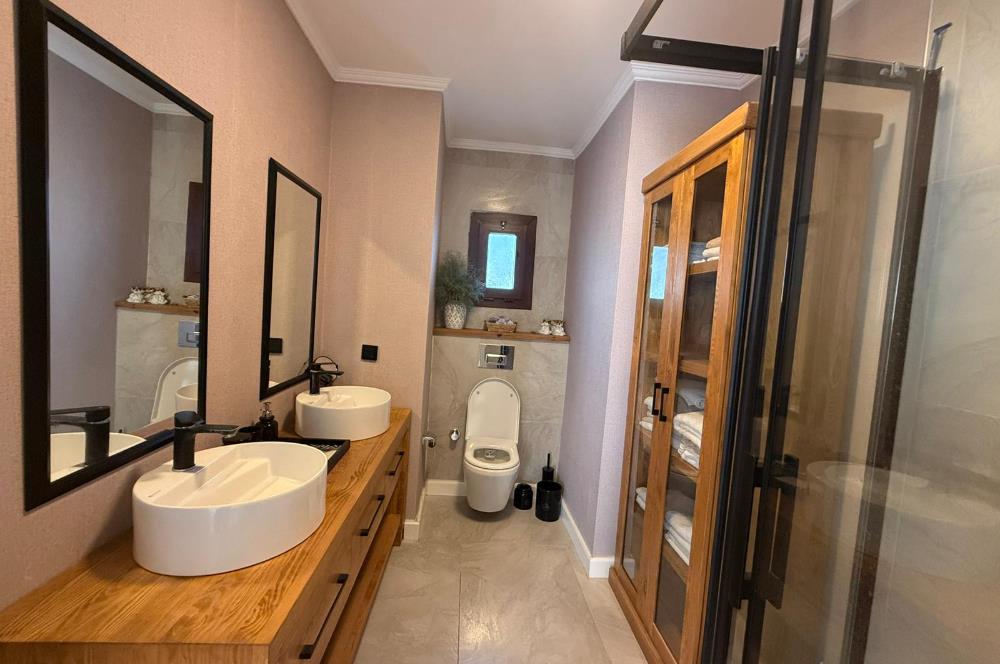 BODRUM GÜNDOĞAN'DA HAVUZLU PLAJLI KİRALIK VİLLA