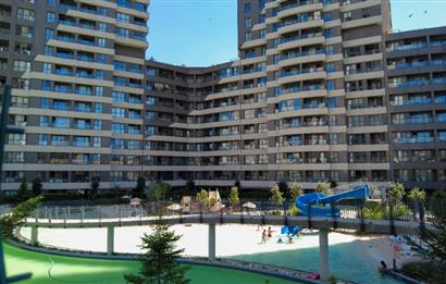 AİLELER İÇİN İDEAL! KUMSALLI, ÇOCUK HAVUZLU SİTE'DE GENİŞ 3.5+1 SATILIK DAİRE