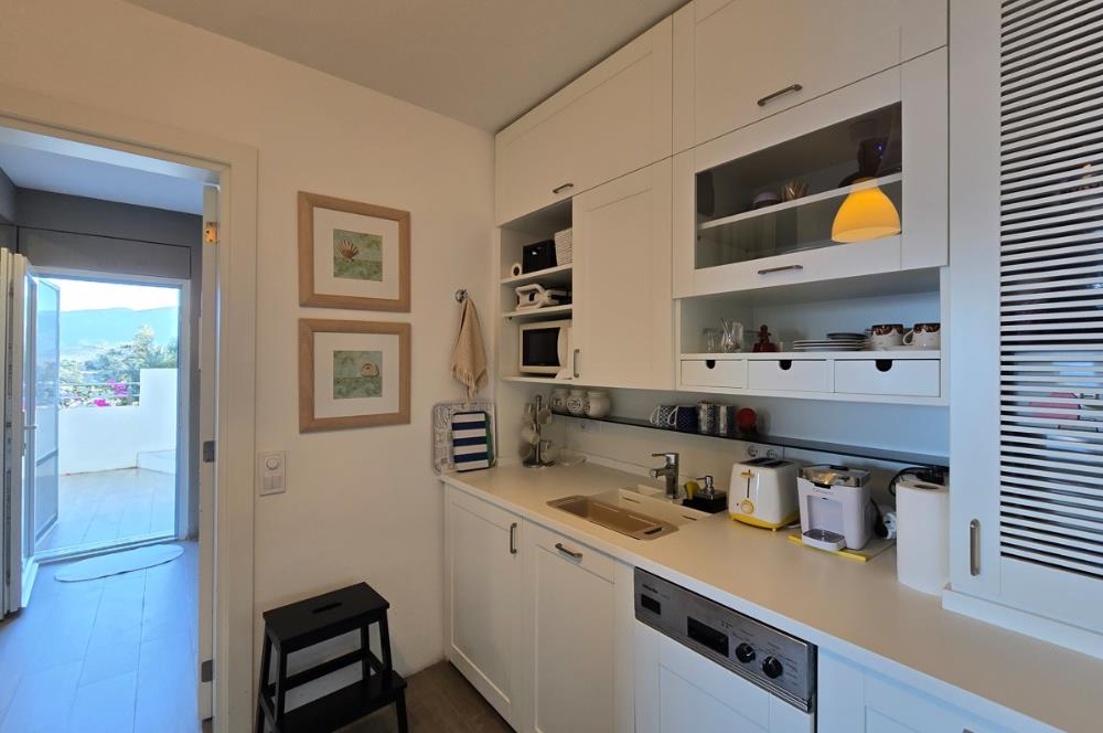 Bodrum Türkbükü Hebilkoy’da Prestijli Olivehill Sitesinde Eşsiz Deniz Manzaralı Satılık Dubleks