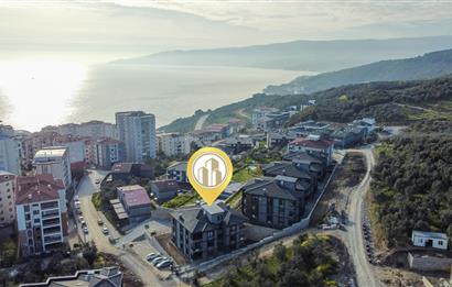 C21 Cius; Havuz ve Bahçeli Site İçerisinde Deniz Manzaralı Daire