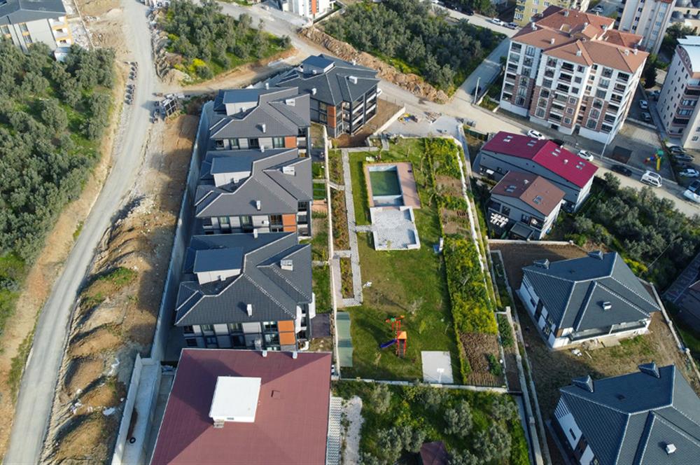 C21 Cius; Havuz ve Bahçeli Site İçerisinde Deniz Manzaralı Daire