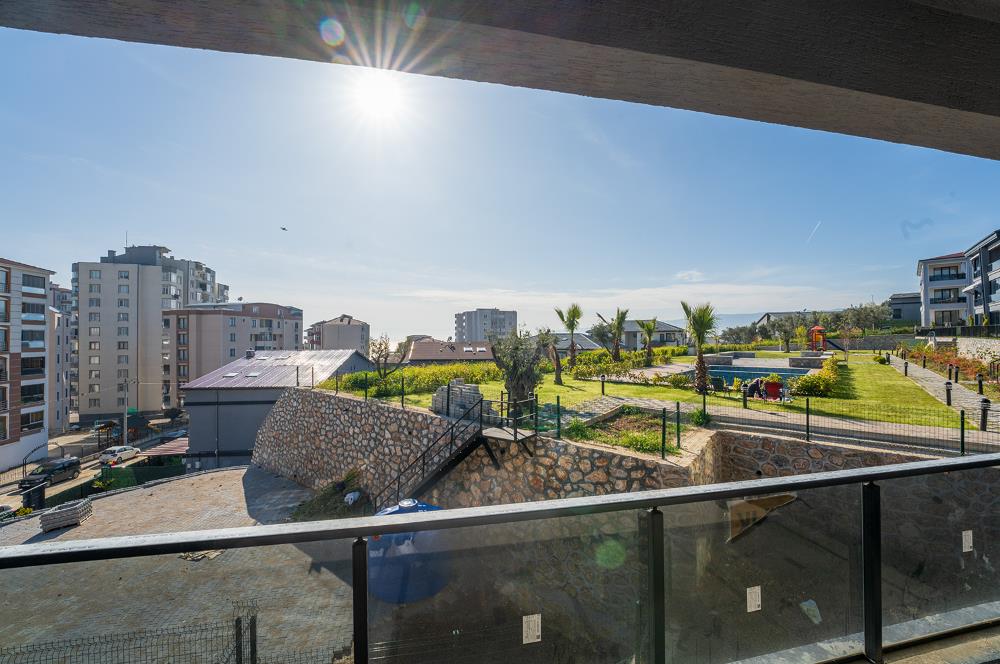 C21 Cius; Havuz ve Bahçeli Site İçerisinde Deniz Manzaralı Daire