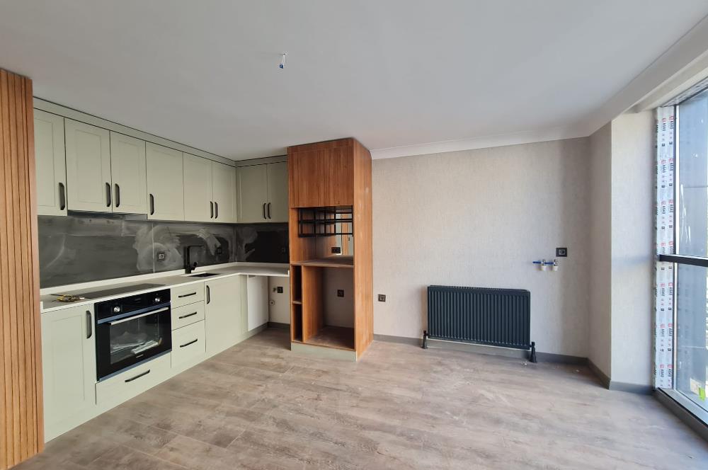 KUĞULU PARKA KOMŞU-MODERN 1+1 AÇIK/KAPALI OTOPARK-GÜVENLİKLİ