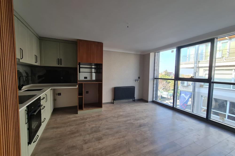 KUĞULU PARKA KOMŞU-MODERN 1+1 AÇIK/KAPALI OTOPARK-GÜVENLİKLİ