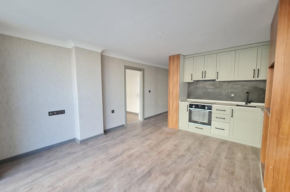 KUĞULU PARKA KOMŞU-MODERN 1+1 AÇIK/KAPALI OTOPARK-GÜVENLİKLİ