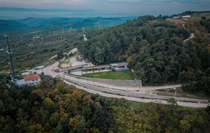 C21 LOCA'DAN MUDANYA ÇEPNİ'DE PANORAMİK MANZARALI EV VE ARAZİSİ