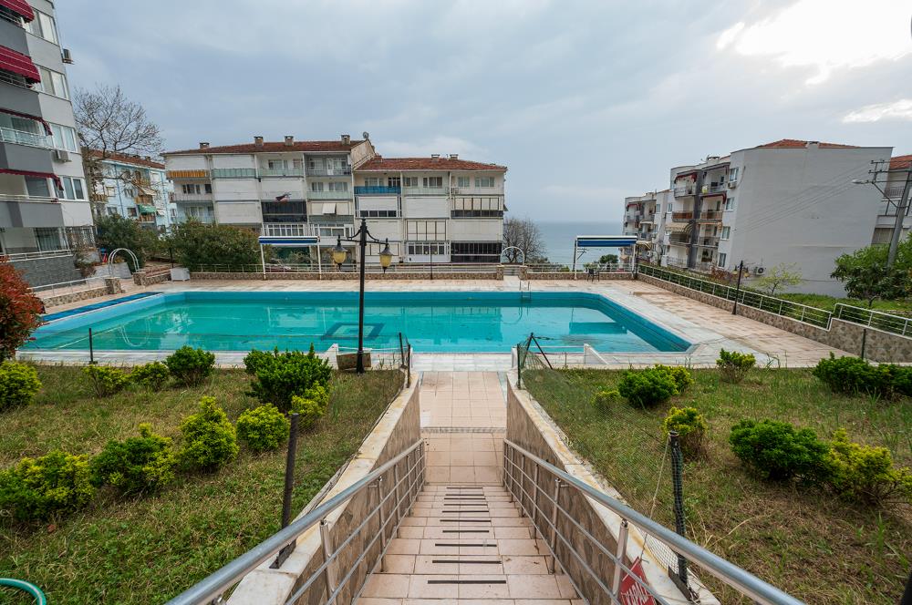 C21 Cius; Havuz ve Plajlı Site İçerisinde Deniz Manzaralı Daire