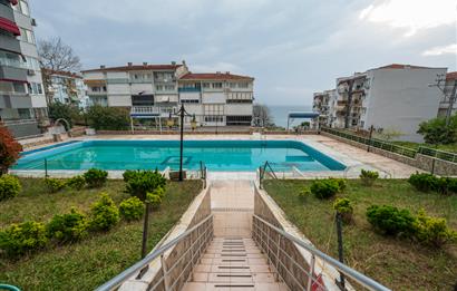 C21 Cius; Havuz ve Plajlı Site İçerisinde Deniz Manzaralı Daire