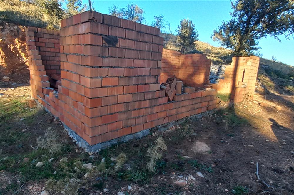 Bodrum Mazı deniz manzaralı, icerisinde kayıtlı ev bulunan satılık tarla