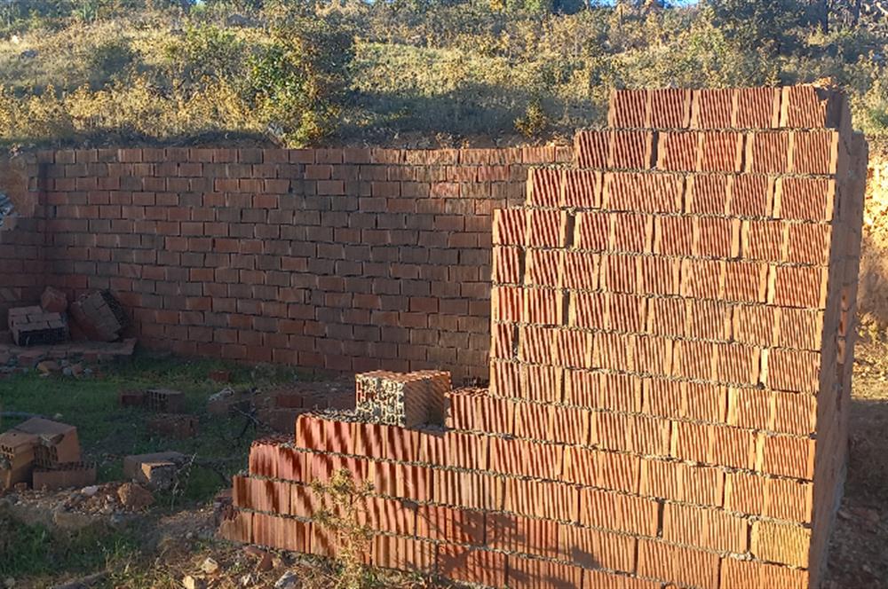 Bodrum Mazı deniz manzaralı, icerisinde kayıtlı ev bulunan satılık tarla