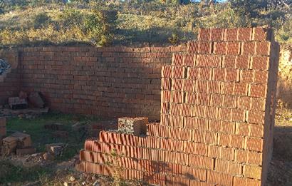 Bodrum Mazı deniz manzaralı, icerisinde kayıtlı ev bulunan satılık tarla