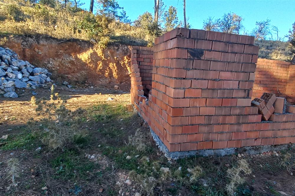 Bodrum Mazı deniz manzaralı, icerisinde kayıtlı ev bulunan satılık tarla