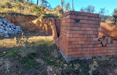 Bodrum Mazı deniz manzaralı, icerisinde kayıtlı ev bulunan satılık tarla