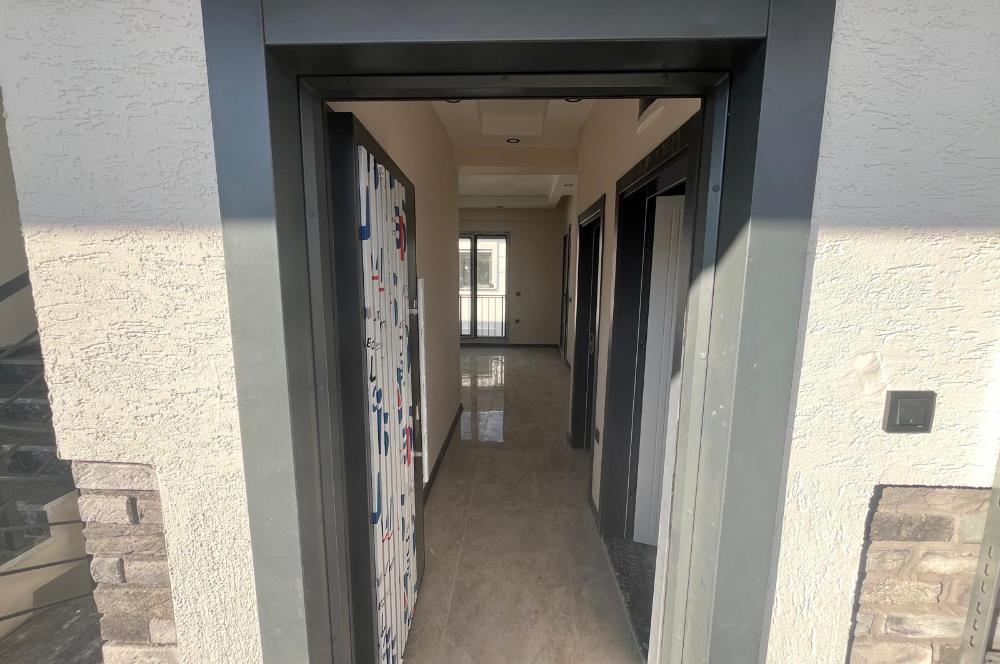 Güre Çamlıbel Zeytin Evleri’nde 1. Kat, Havuzlu, Bahçe Kullanımlı, Kapalı Otoparklı SATILIK DAİRE 1+1