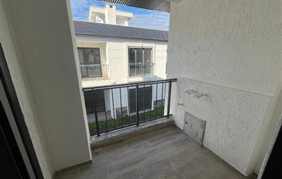 Güre Çamlıbel Zeytin Evleri’nde 1. Kat, Havuzlu, Bahçe Kullanımlı, Kapalı Otoparklı SATILIK DAİRE 1+1