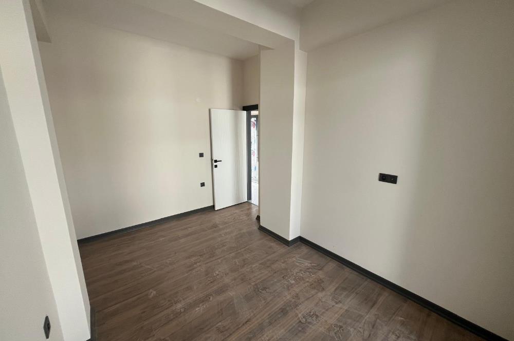 Güre Çamlıbel Zeytin Evleri’nde 1. Kat, Havuzlu, Bahçe Kullanımlı, Kapalı Otoparklı SATILIK DAİRE 1+1