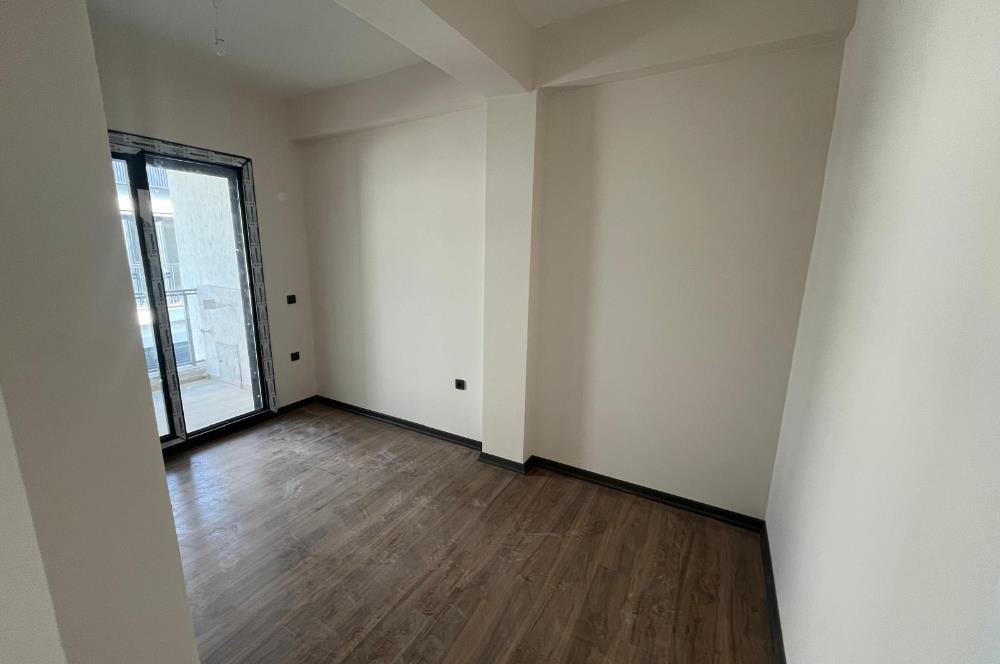 Güre Çamlıbel Zeytin Evleri’nde 1. Kat, Havuzlu, Bahçe Kullanımlı, Kapalı Otoparklı SATILIK DAİRE 1+1