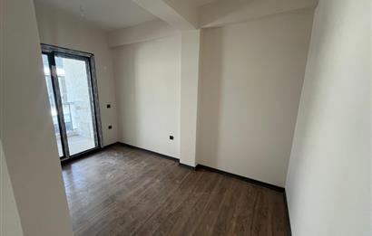 Güre Çamlıbel Zeytin Evleri’nde 1. Kat, Havuzlu, Bahçe Kullanımlı, Kapalı Otoparklı SATILIK DAİRE 1+1