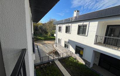 Güre Çamlıbel Zeytin Evleri’nde 1. Kat, Havuzlu, Bahçe Kullanımlı, Kapalı Otoparklı SATILIK DAİRE 1+1