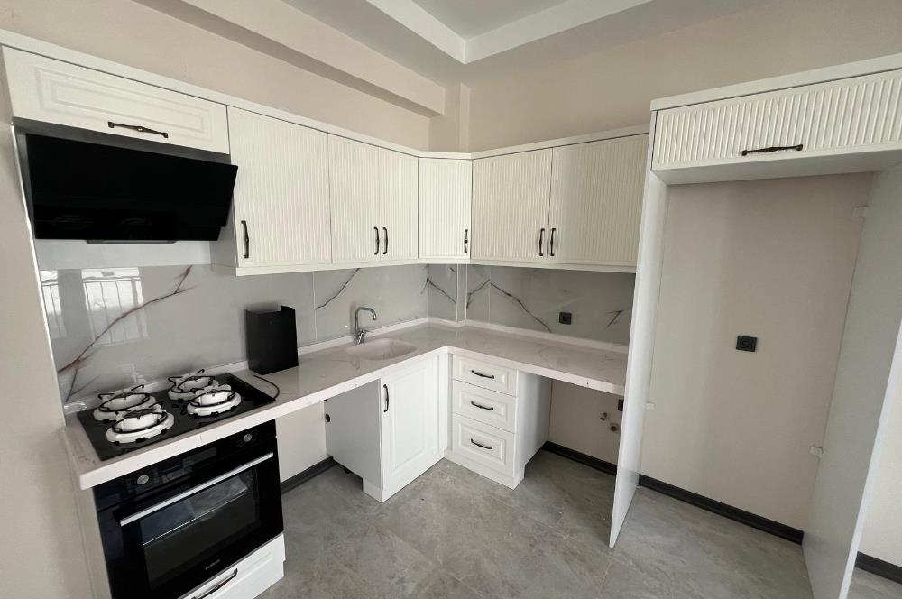 Güre Çamlıbel Zeytin Evleri’nde 1. Kat, Havuzlu, Bahçe Kullanımlı, Kapalı Otoparklı SATILIK DAİRE 1+1