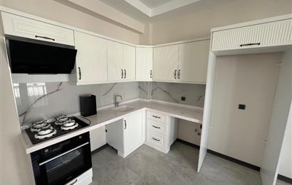 Güre Çamlıbel Zeytin Evleri’nde 1. Kat, Havuzlu, Bahçe Kullanımlı, Kapalı Otoparklı SATILIK DAİRE 1+1