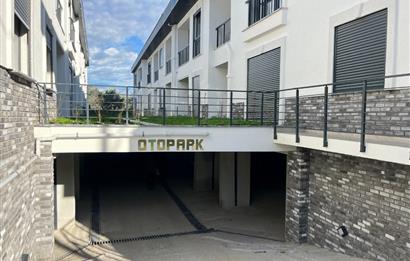 Güre Çamlıbel Zeytin Evleri’nde 1. Kat, Havuzlu, Bahçe Kullanımlı, Kapalı Otoparklı SATILIK DAİRE 1+1