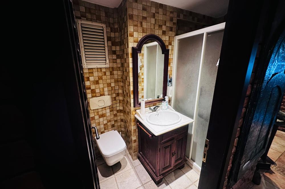 BOSTANCI KÜÇÜKYALI SINIRINDA MİNİBÜS YOLUNDA SATILIK OFİS