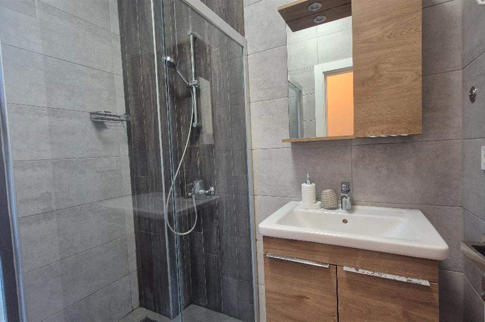 Bodrum Gündoğan Küçükbük'te Satılık 2+1 Bahçe Katı Daire