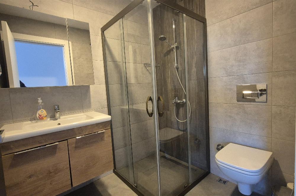 Bodrum Gündoğan Küçükbük'te Satılık 2+1 Bahçe Katı Daire