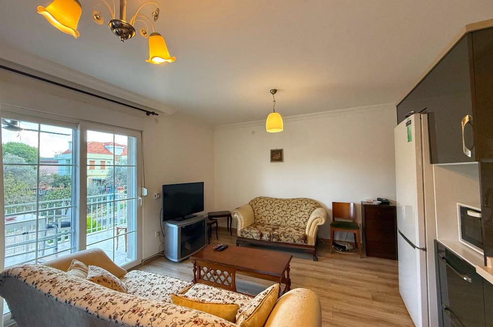 Datça Merkez'de Satılık Bahçeli Ara Kat 2+1 Balkonlu Geniş Daire