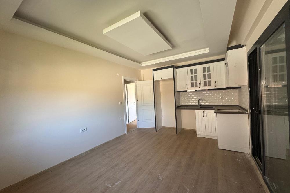 Foça Bağarası'nda Site İçerisinde Bahçe Katı 2+1 Kiralık Daire