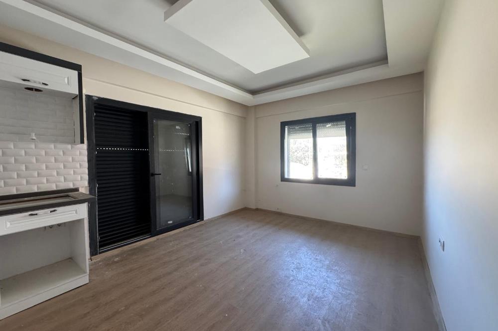 Foça Bağarası'nda Site İçerisinde Bahçe Katı 2+1 Kiralık Daire