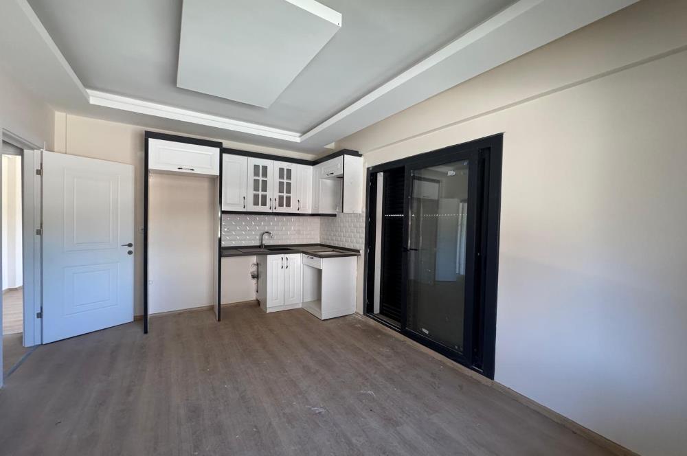 Foça Bağarası'nda Site İçerisinde Bahçe Katı 2+1 Kiralık Daire