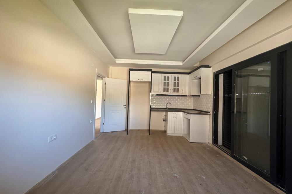 Foça Bağarası'nda Site İçerisinde Bahçe Katı 2+1 Kiralık Daire