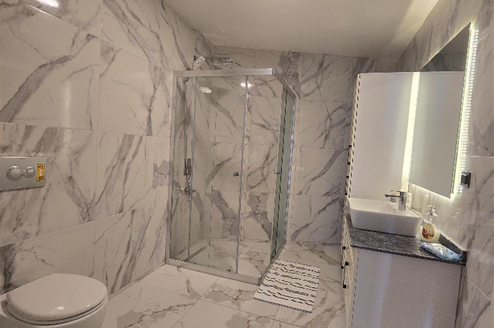 BODRUM GÜMÜŞLÜK DENİZE SIFIR İSKELELİ SATILIK DAİRE