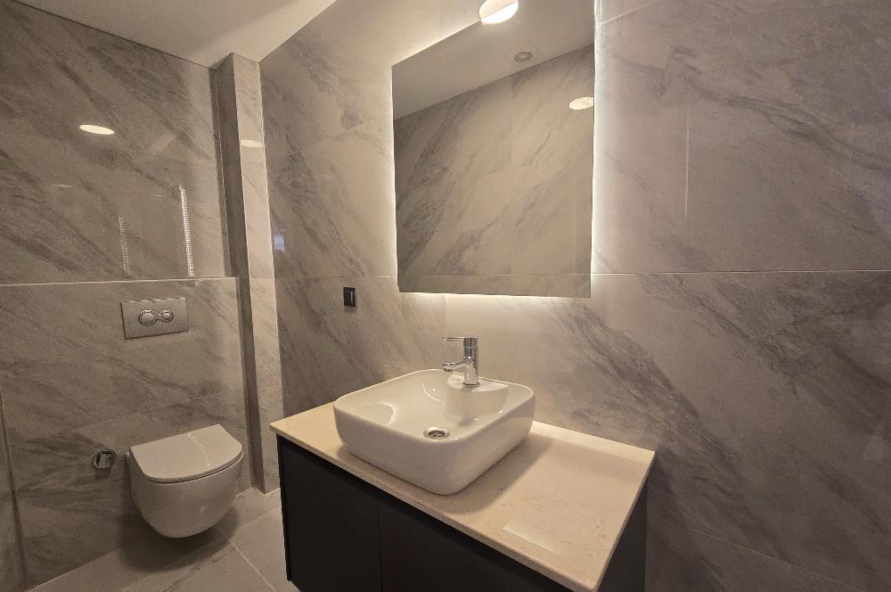 BODRUM GÜMÜŞLÜK PLAJLI İSKELELİ SOSYAL TESİSLİ SATILIK DAİRE